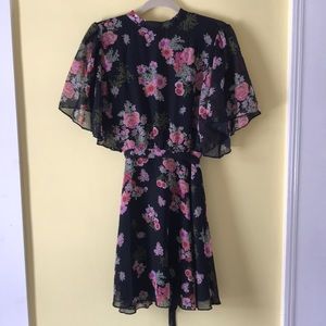 High neck, open back, mini dress